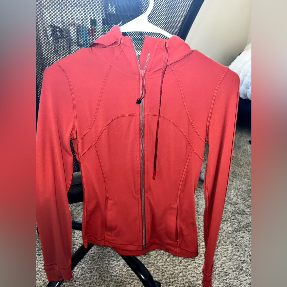 Lululemon orange define jacket with hood. Size 4!
